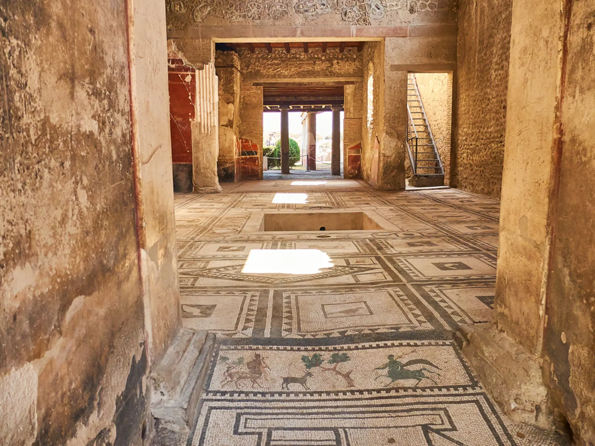 Utsnitt av et mosaikkgulv i en gammel romersk villa i Pompeii